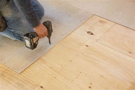 Can tiles be laid on laminated fiber cement boards?